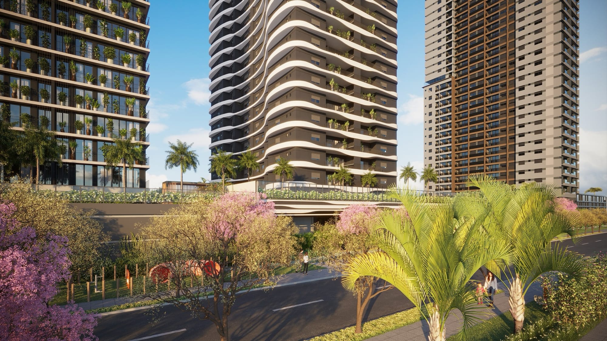 Cinturão verde com árvore e mobiliário urbano à frente de torres residenciais
